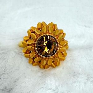 Vintage Avon Gold Tone Layered Starburst with Round Brown Crystal Stone